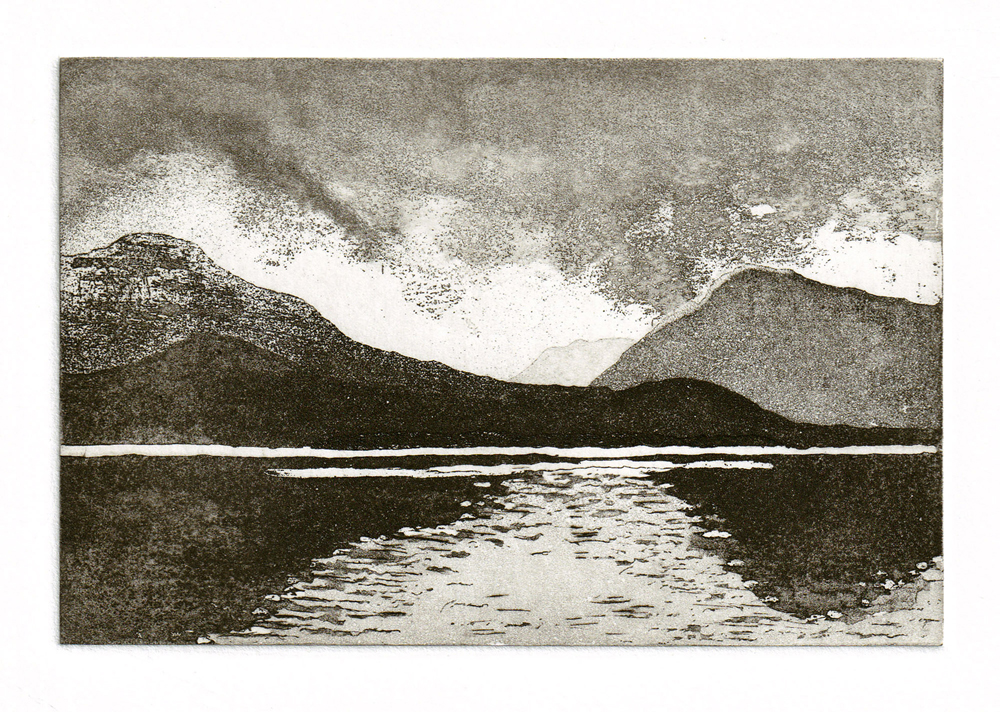 An original aquatint etching created by Jill Welham. A view of mountains and their reflections in Loch Maree in the Scottish Highlands. Printed in sepia ink.